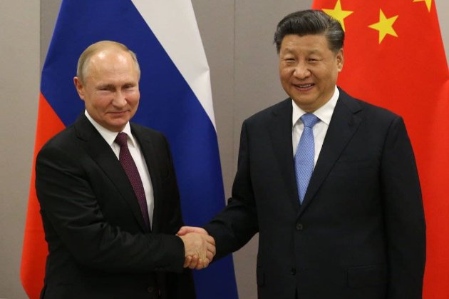 Сі Цзіньпін міг попросити Путіна не нападати на Україну під час Олімпійських ігор в Пекіні — Bloomberg 