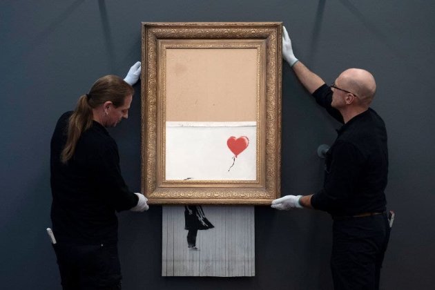 Порезанную шредером картину Бэнкси продали на аукционе за рекордные $25,4 млн